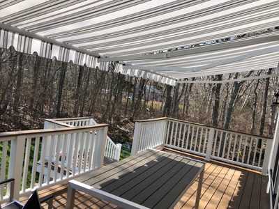 under view of two retractable awnings